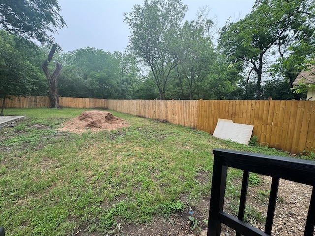 view of yard with a fenced backyard
