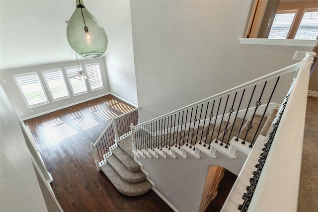 7955 Rasor Dr, Frisco, TX 75036 - staircase featuring ceiling fan, wood finished floors, and baseboards