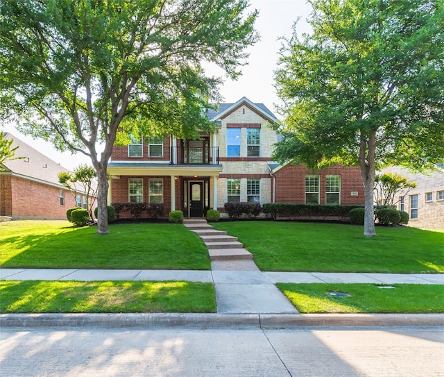 7955 Rasor Dr, Frisco, TX 75036 - view of front of property with a front yard and brick siding