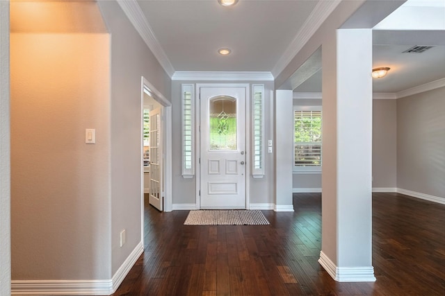 7955 Rasor Dr, Frisco, TX 75036 - foyer featuring dark wood finished floors, baseboards, ornamental molding, and recessed lighting