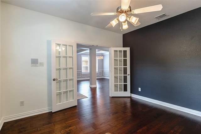 7955 Rasor Dr, Frisco, TX 75036 - empty room featuring french doors, baseboards, and dark wood-style floors
