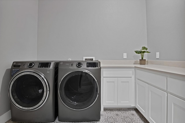 108 Grace View Rd, Weatherford, TX 76088 - clothes washing area featuring cabinet space and washer and clothes dryer