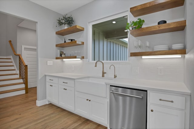 108 Grace View Rd, Weatherford, TX 76088 - bar with light wood finished floors, a sink, stairway, decorative backsplash, and dishwasher
