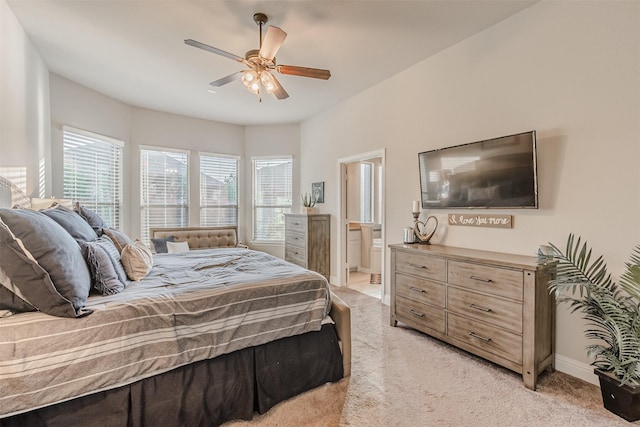 14733 Cedar Flat Way, Fort Worth, TX 76262 - bedroom featuring ceiling fan, baseboards, ensuite bath, and light carpet