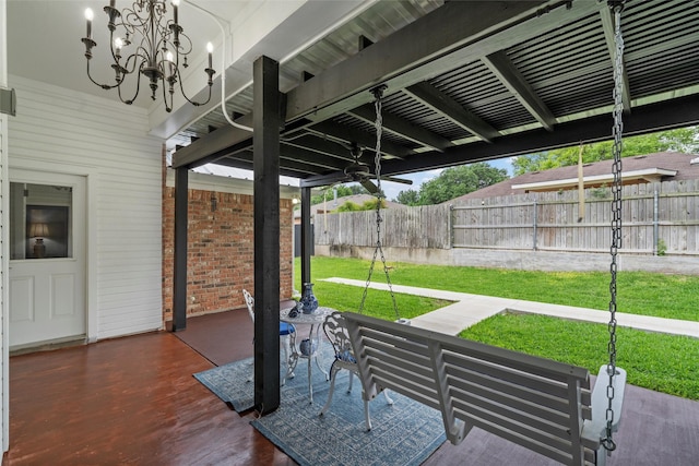 view of patio featuring fence, a ceiling fan, and a wooden deck
