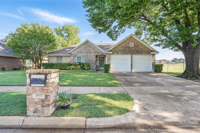 single story home with driveway, a front yard, brick siding, and a garage