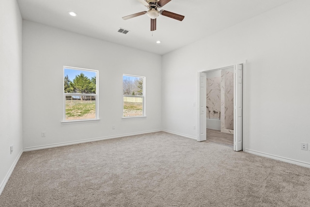 unfurnished bedroom featuring recessed lighting, visible vents, carpet, and baseboards