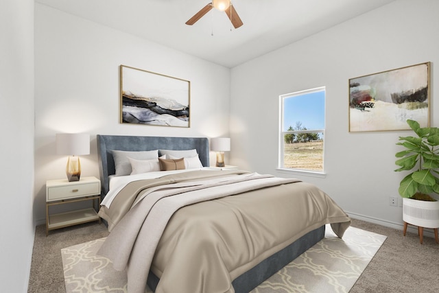 bedroom featuring ceiling fan, baseboards, and carpet floors