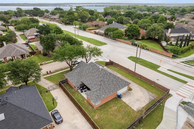 aerial view featuring a water view and a residential view