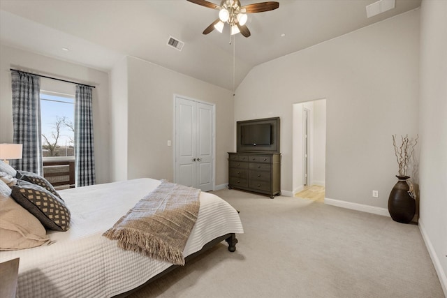 bedroom with visible vents, vaulted ceiling, light colored carpet, and baseboards