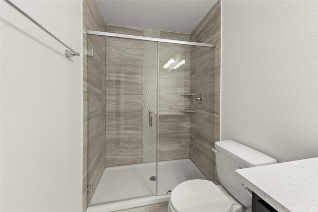 202 Griffith, Princeton, TX 75407 - bathroom featuring toilet, vanity, and a shower stall