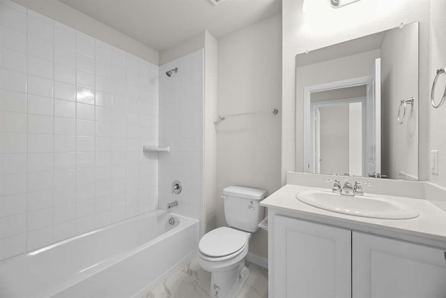 bathroom with marble finish floor, toilet, shower / washtub combination, vanity, and baseboards