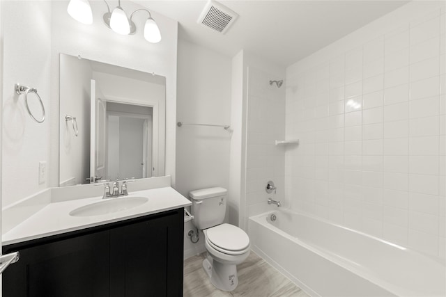 202 Griffith, Princeton, TX 75407 - bathroom featuring toilet, vanity, shower / bath combination, and wood finished floors