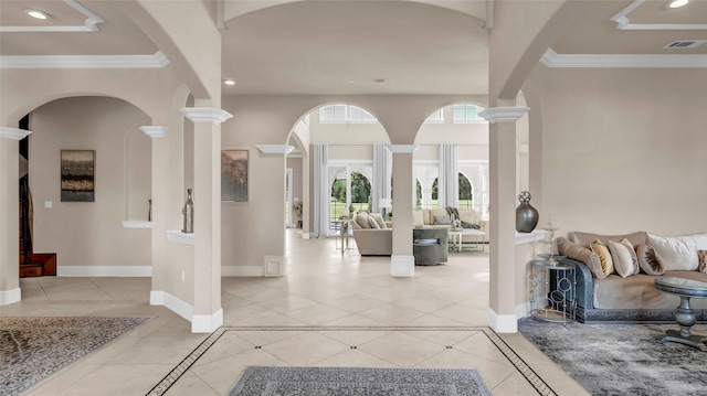 foyer entrance with baseboards, visible vents, ornate columns, and recessed lighting