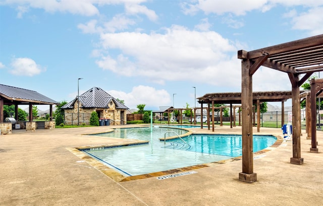 300 Copper Switch Dr, Anna, TX 75409 - pool with fence, a patio area, grilling area, and a pergola