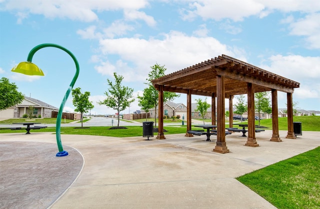 300 Copper Switch Dr, Anna, TX 75409 - view of property's community with a pergola, a yard, and fence