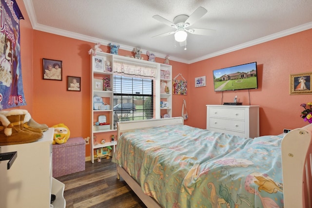 bedroom featuring wood finished floors, ceiling fan, a textured ceiling, and crown molding