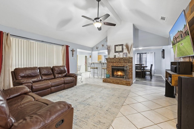 living room featuring light tile patterned floors, beamed ceiling, visible vents, ceiling fan, and high vaulted ceiling
