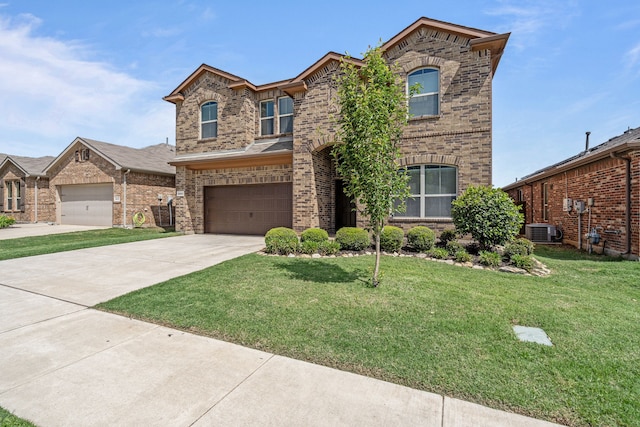 view of front of house featuring driveway, central AC, an attached garage, and brick siding