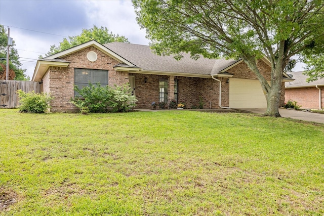ranch-style house with brick siding, fence, a front lawn, and driveway