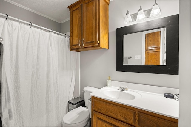 full bathroom featuring ornamental molding, toilet, vanity, curtained shower, and a textured ceiling