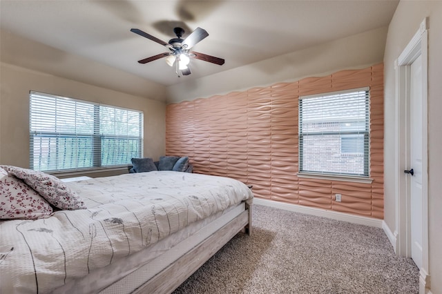 751 Chateaus Dr, Coppell, TX 75019 - carpeted bedroom with baseboards and a ceiling fan