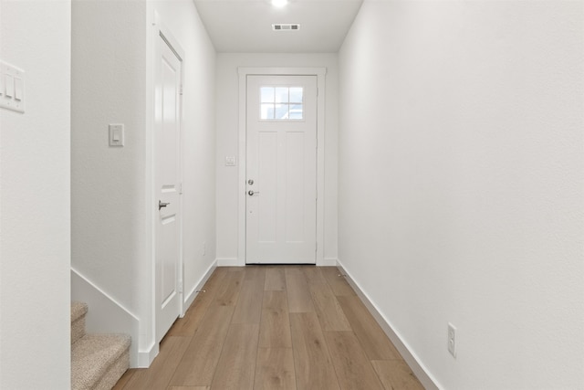 723 Tower Rd, Wylie, TX 75098 - doorway featuring light wood-type flooring and baseboards
