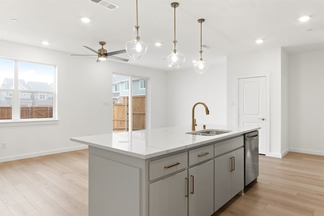 723 Tower Rd, Wylie, TX 75098 - kitchen featuring a sink, healthy amount of natural light, dishwasher, light wood-type flooring, and recessed lighting