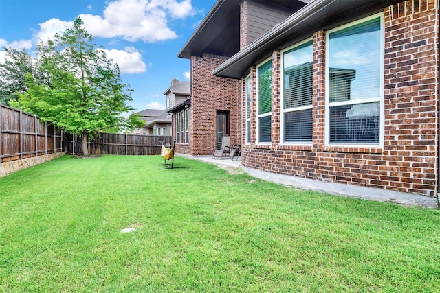 12810 Avanti Dr, Frisco, TX 75035 - view of yard featuring a fenced backyard and a patio area
