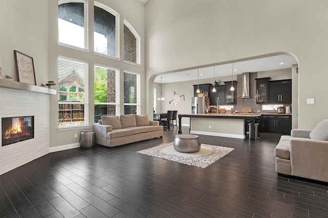 12810 Avanti Dr, Frisco, TX 75035 - playroom with crown molding, arched walkways, a chandelier, and visible vents