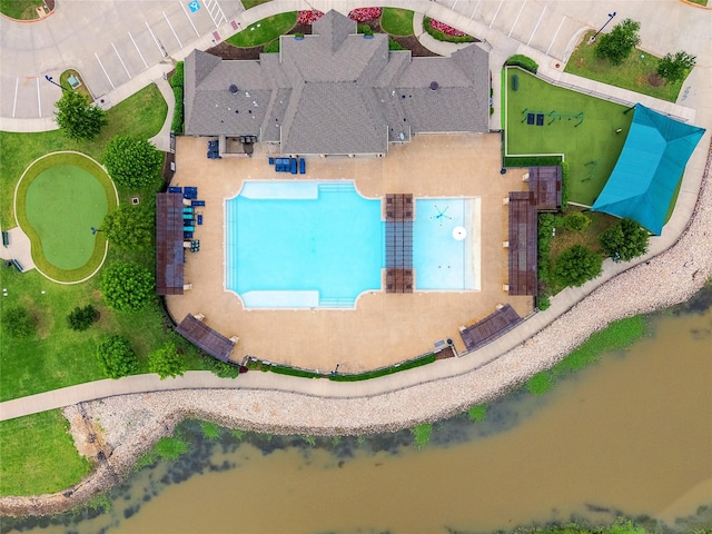 bird's eye view with a water view and a residential view