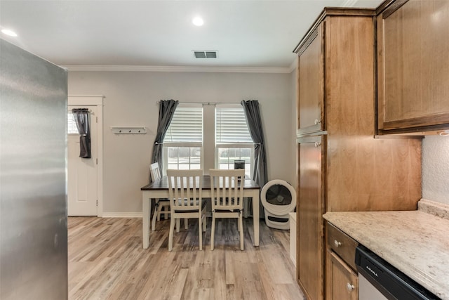 kitchen featuring stainless steel dishwasher, visible vents, plenty of natural light, light wood-type flooring, and ornamental molding