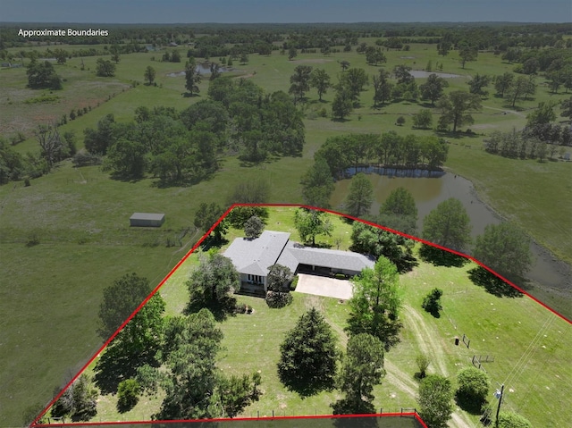 bird's eye view featuring a rural view and a water view
