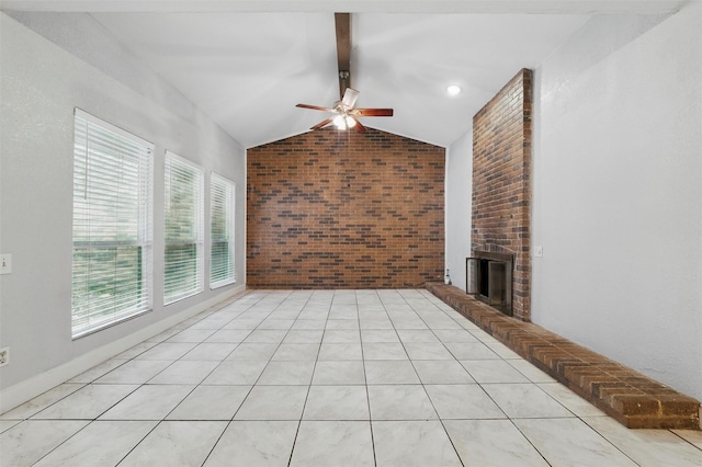 unfurnished living room with ceiling fan, lofted ceiling with beams, a brick fireplace, and brick wall
