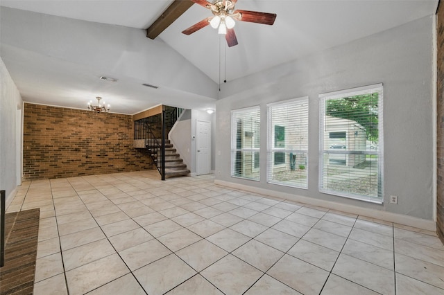 unfurnished living room with visible vents, stairs, brick wall, beamed ceiling, and ceiling fan with notable chandelier