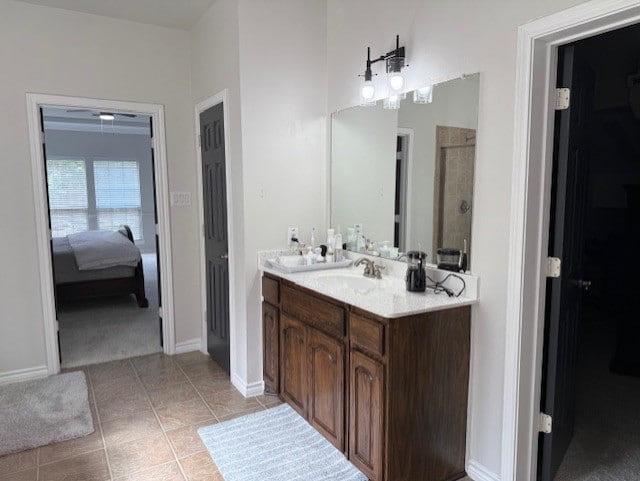 3609 S Texas Dr, Sachse, TX 75048 - full bath featuring baseboards, tile patterned floors, tiled shower, and vanity