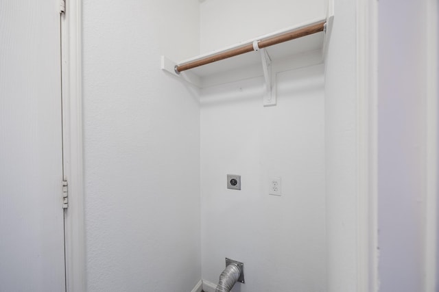 washroom with electric dryer hookup and laundry area