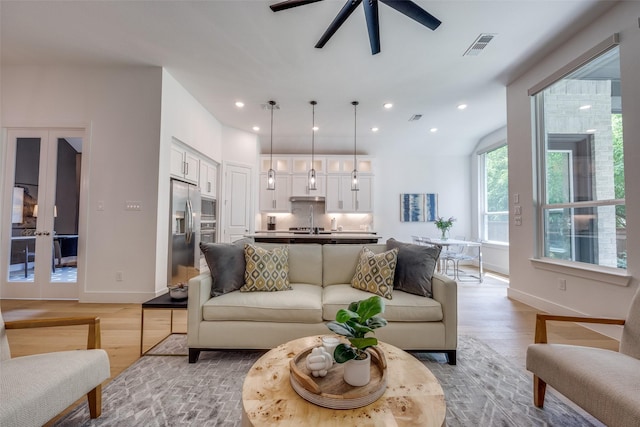 1823 Bell Ct, Van Alstyne, TX 75495 - living area with light wood-style flooring, ceiling fan, and recessed lighting