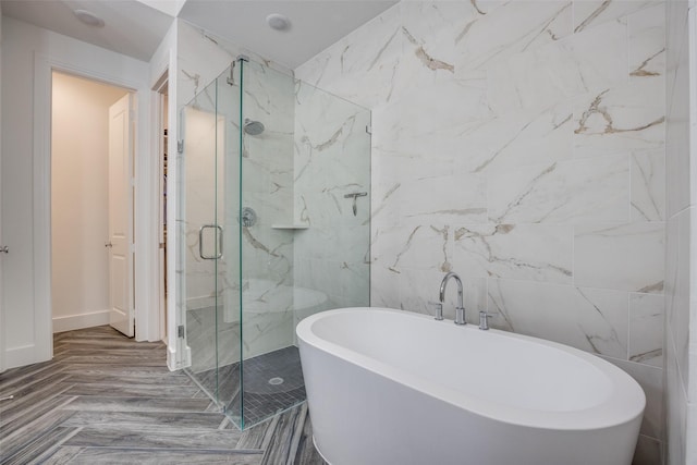 1823 Bell Ct, Van Alstyne, TX 75495 - full bath featuring a marble finish shower, a freestanding tub, and tile walls