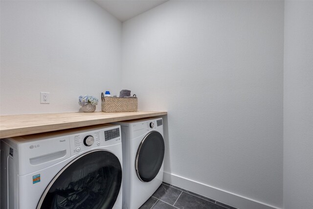 1823 Bell Ct, Van Alstyne, TX 75495 - laundry room featuring washing machine and clothes dryer and dark tile patterned floors