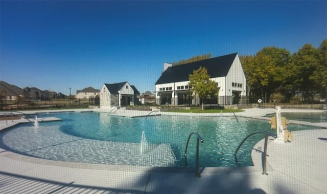 1823 Bell Ct, Van Alstyne, TX 75495 - community pool featuring a patio area