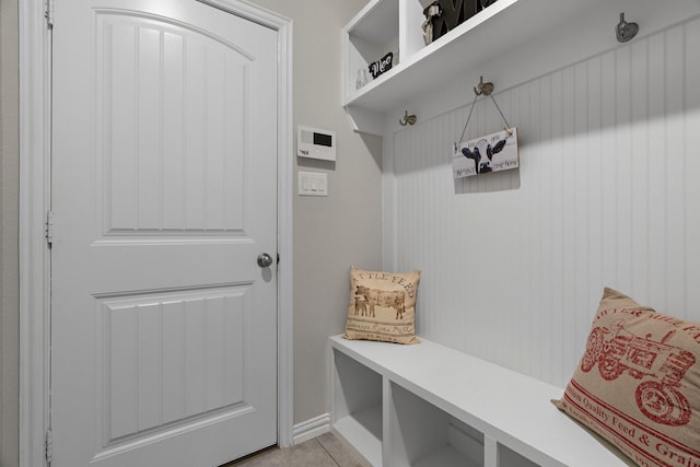 mudroom with light tile patterned floors