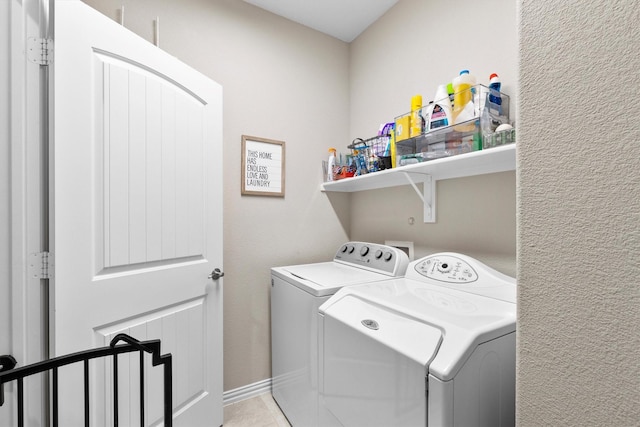 laundry room with washer and dryer and laundry area