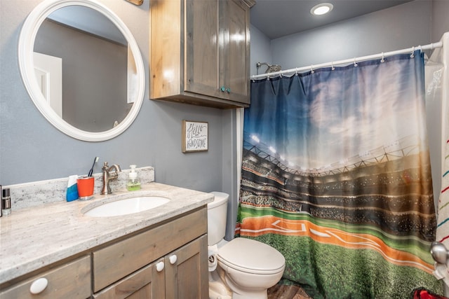full bath with a shower with shower curtain, toilet, and vanity