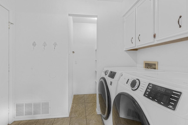 832 Ridgeview Dr, Burleson, TX 76028 - clothes washing area with visible vents, cabinet space, light tile patterned floors, baseboards, and washer and clothes dryer