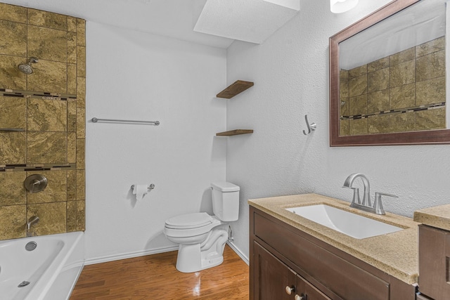 832 Ridgeview Dr, Burleson, TX 76028 - bathroom featuring vanity, shower / bathing tub combination, wood finished floors, and toilet