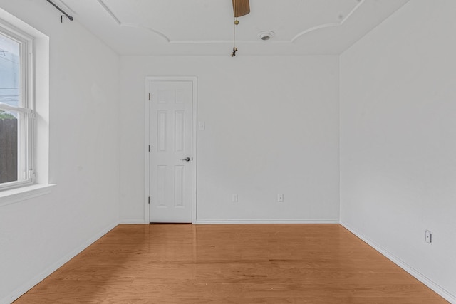 832 Ridgeview Dr, Burleson, TX 76028 - empty room featuring a ceiling fan, baseboards, and wood finished floors