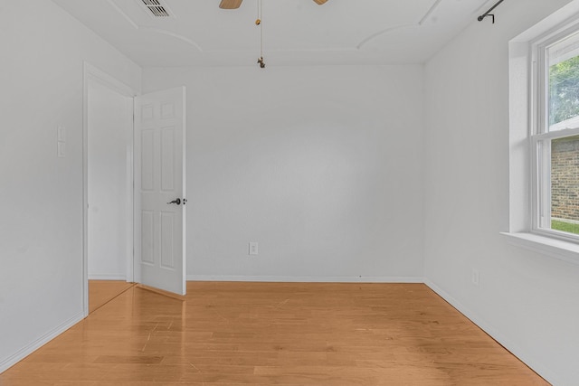 832 Ridgeview Dr, Burleson, TX 76028 - empty room with light wood-style floors, baseboards, plenty of natural light, and ceiling fan