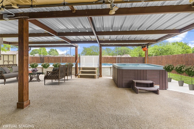 832 Ridgeview Dr, Burleson, TX 76028 - view of patio with a hot tub, a swimming pool, an outdoor living space, and a fenced backyard