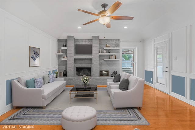 832 Ridgeview Dr, Burleson, TX 76028 - living area featuring a ceiling fan, a fireplace, vaulted ceiling, light wood-type flooring, and baseboards